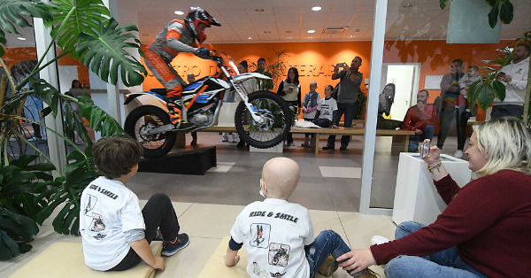 Jumping an e-motorbike in the hall of Trento Proton Therapy Center